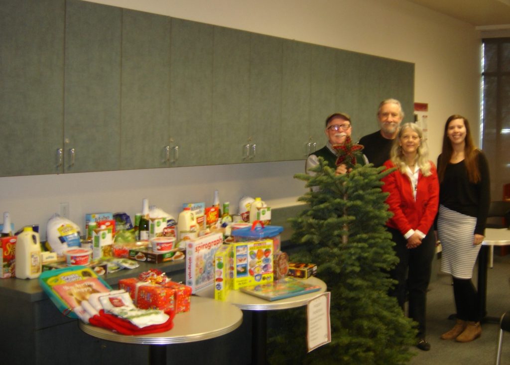 Faculty providing Holiday food and gift baskets